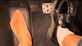 Driving and pedal pumping in my white socks , tights and one shoe