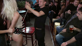 Slim bound blonde ravaged in public bar