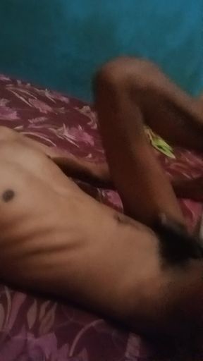 Guy undresses and is naked on the bed