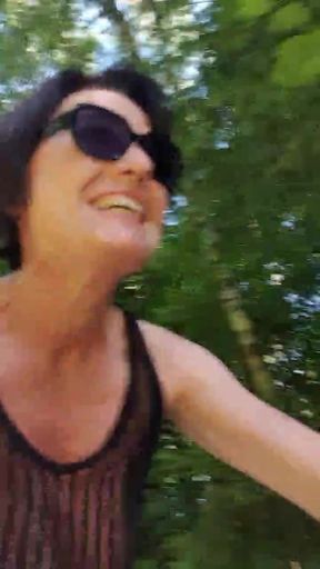 Julie shows vagina while riding a bike