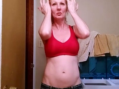 Redheaded amateur MILF with a sex toy on webcam show