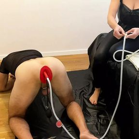 xxxbat mistress plays with Rubberfashion enema plug and her slave