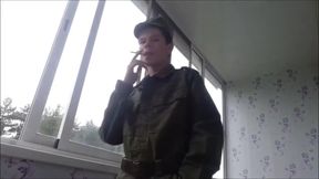 Russian soldier smokes spits jerks his cock cumming all over his army boots