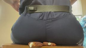 Police Officer Sitting And Farting On Eclairs