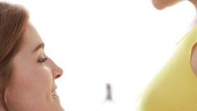 ”Sexy brunette licks a redhead twat as she does a video call”