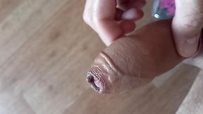 Screams of pleasure as foreskin fills with cum from big cock