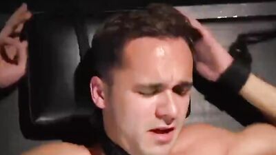 Tied up chap gets his prick jerked by his perverted mate