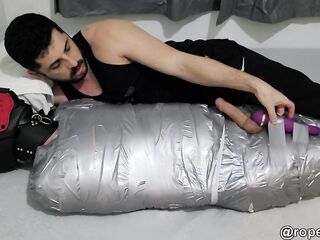 mnummified serf doggo being used by his taskmaster
