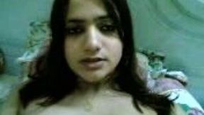 Spoiled Arab teen chick with perky tits fingers her tight pussy on cam