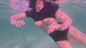 Amateur long legs girl's relaxing underwater swimming POV