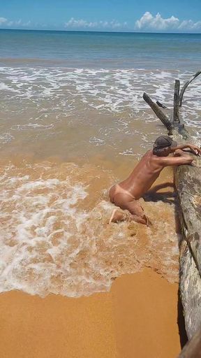 Naked ladysilva on the beach showing off her tanned hot ass with sexy mark