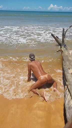 Naked ladysilva on the beach showing off her tanned hot ass with sexy mark