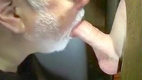 Nasty mandy sucks a cock through the gloryhole