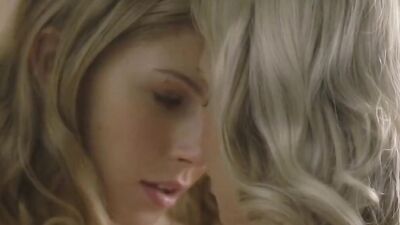 Two delightful blonde ladies are enjoying every moment of sapphic lovemaking