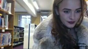 Kinky curly alluring webcam girlie posed in her fur coat for me