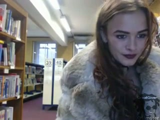 Kinky curly alluring webcam girlie posed in her fur coat for me