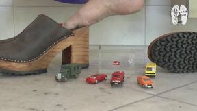 Expensive collector Cars under hard wooden Clogs floor view