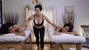 MILF massages pussies of two skinny asians in an impeccable manner