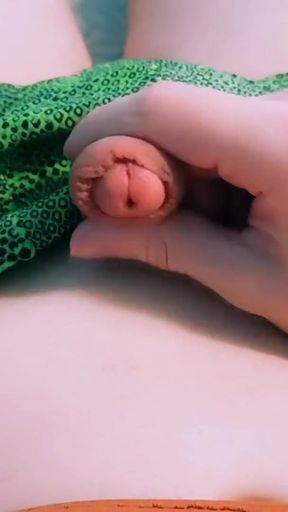 Captivating moment from "Guy in Beautiful Green Swimming Trunks Erotically Massages His"