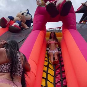 Horny lesbians fucking in a bouncy castle