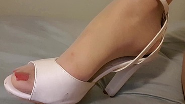 Dani Leg in Tan Pantyhose With Red Toe Nails