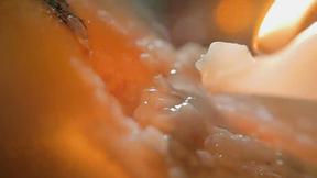 ”Hot brunette squirting as she fucks herself with a lit candle”