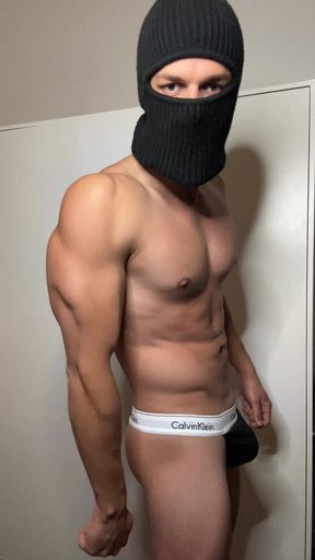 Young hunk strips in thong