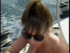Nice outdoor boat fuck for a sexy big breasted brunette wearing sunglasses
