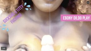 Ebony sucks and titty fucks a hard cock