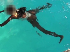 See through bright bikini in swimming that is public