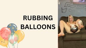 rubbing balloons pussy