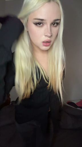 White trans girl in a black fishnet bodysuit teases her cock