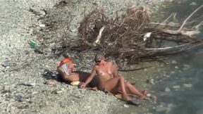 Couple fucking on a public beach, while walking past people