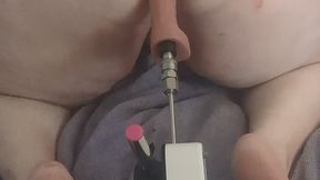 Chubby guy has fun with his fucking machine