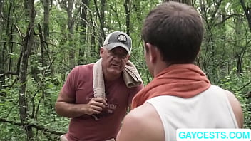 DILF stepdaddy sucks stepsons cock and fuck his ass in woods