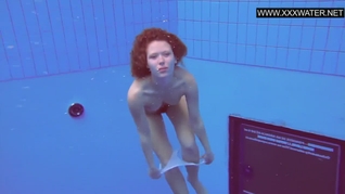 Ginger small tits teen Katka swimming