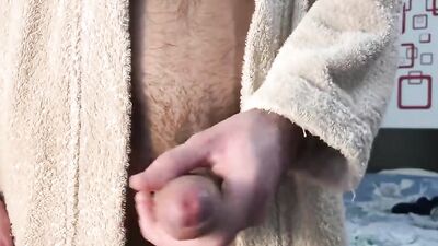 Perverted stepdad is stroking his dong after the hot shower