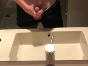 Blasting a load on hotel mirror