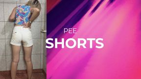 pee in wthite shorts