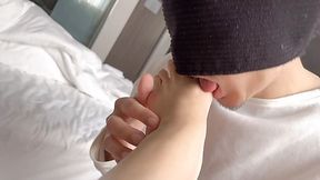 Young Japapanese girl sucks dick with some foot fetish