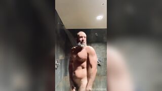 Bearded muscled jock urinates in gym locker guest room douche