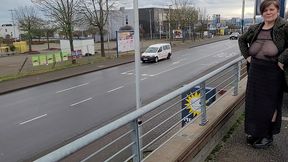braless with sheer top in the street