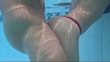 Petite teen gives a wild underwater fuck in the pool
