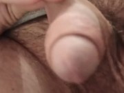 Peeing in the toilet close-up.