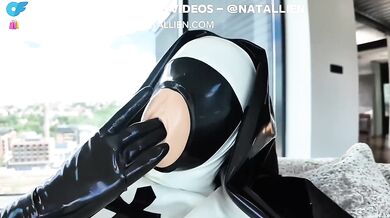 Femdom crushes me under her heavy latex condom suit