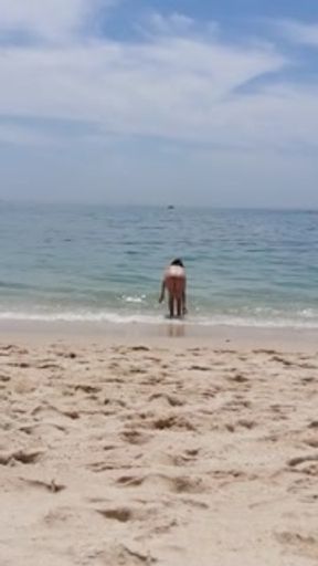 Tenn exhib in public beach portugal