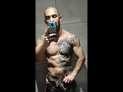 Checking out my muscle and tattoos