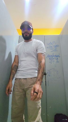 Masturbating in a public bathroom