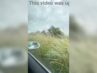 The stepmother is nervous because she wants to go shopping but he stops the car in a public parking lot and makes her give him a blowjob.