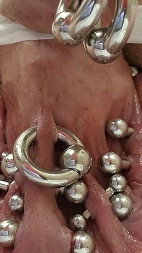 Iconic moment from &quot;Stretching 8 gauge piercings to 6 gauge on scrotum with pre cum&quot;